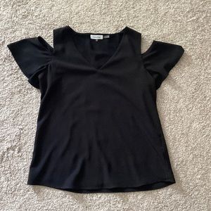 Calvin Klein black lined blouse. Size Large. 100% polyester